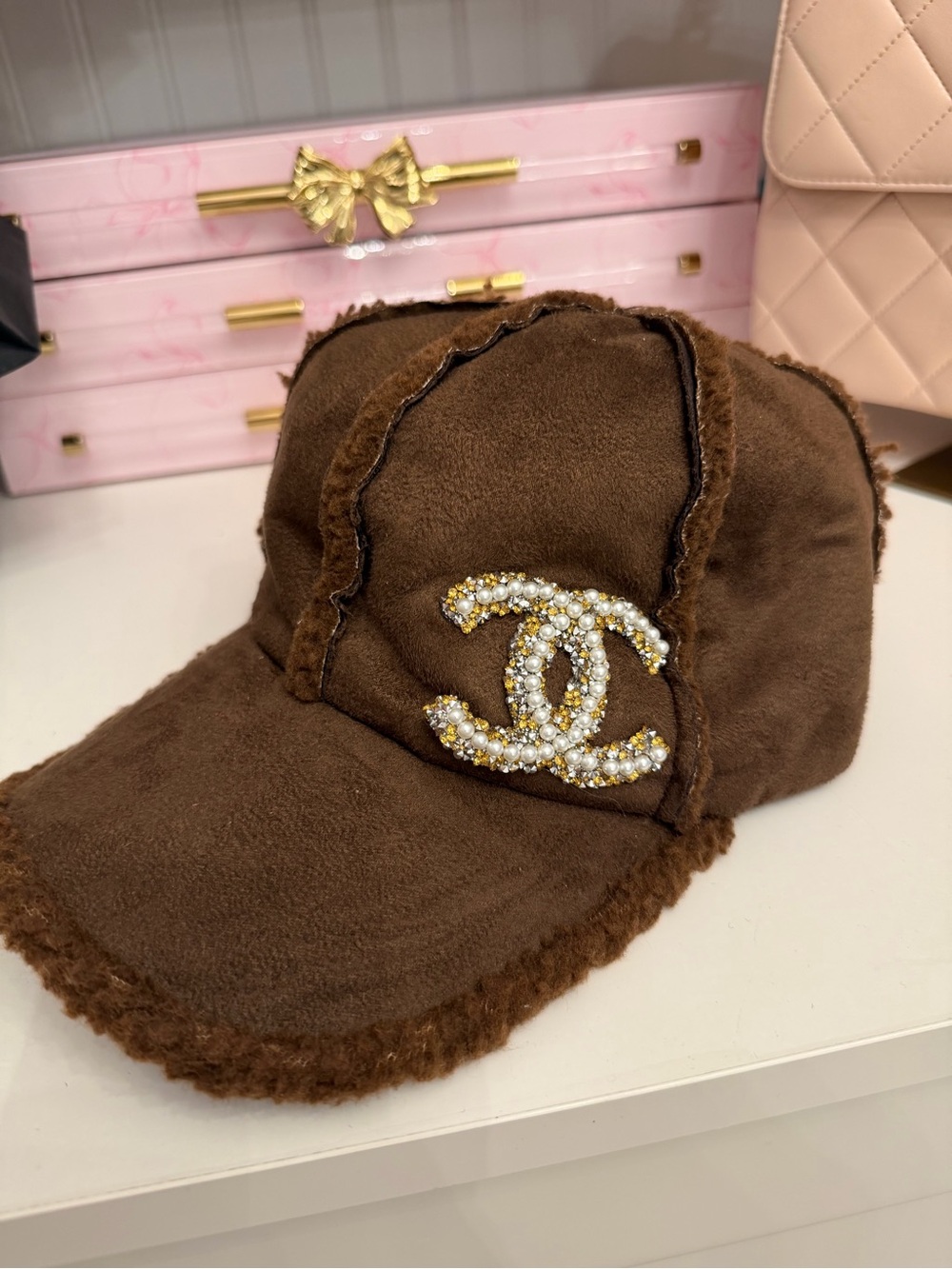 Boutique Brown Shearling Baseball Cap with Crystal Logo. Never worn!